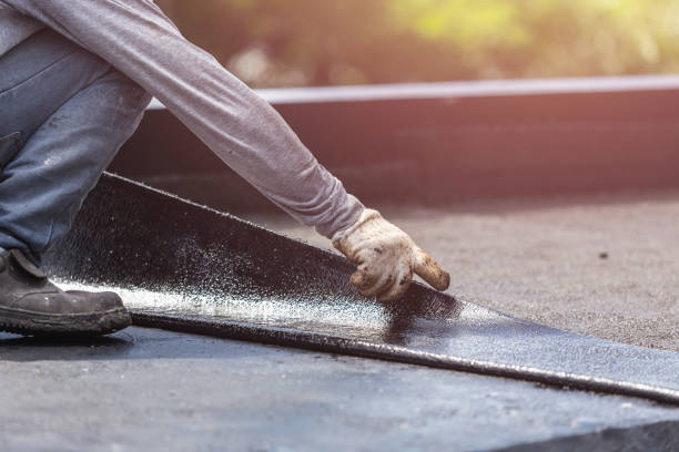 Professional Basement Waterproofing technician working in Bayville, NY